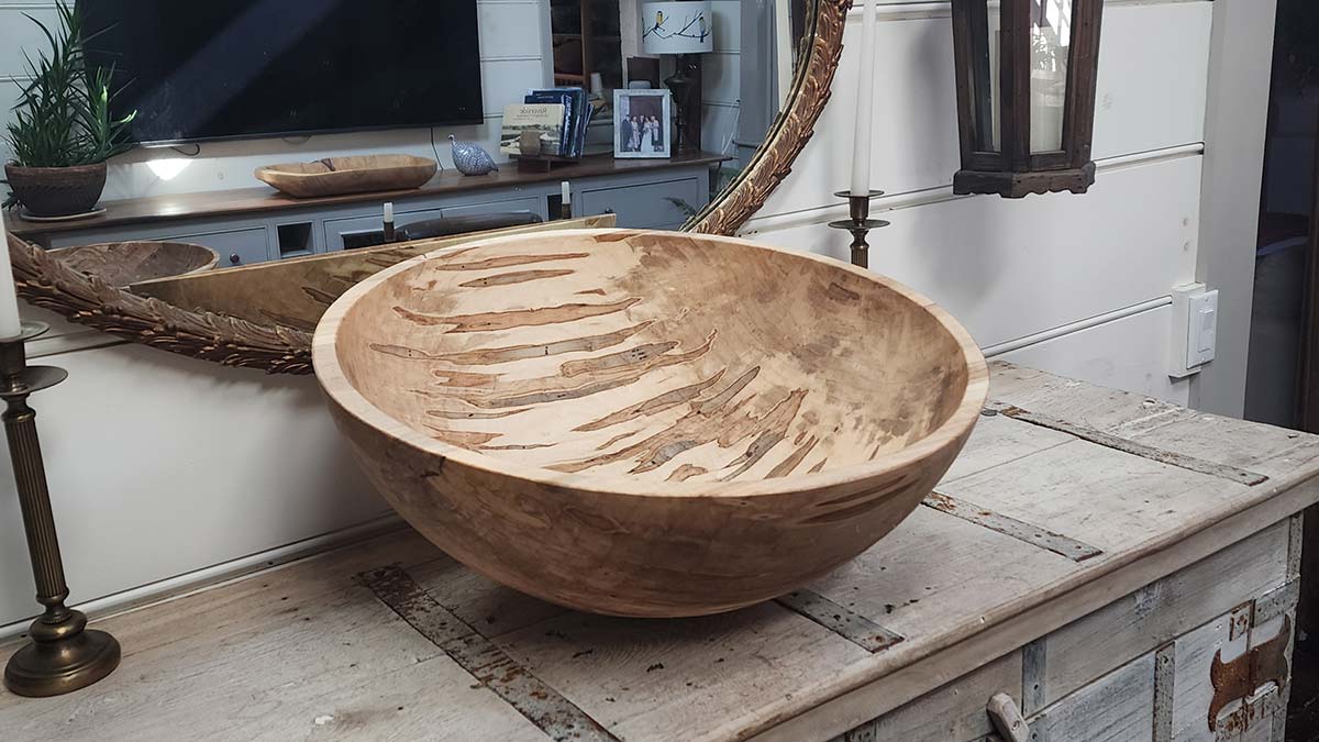 Large hand turned wooden spalted maple bowl with natural grain displayed on a rustic New England table Hand-Turned Wooden Bowls-2.jpg