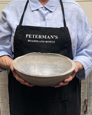 Small 10-inch driftwood oak oval, live edge wooden bowl, handcrafted with a natural live edge design.