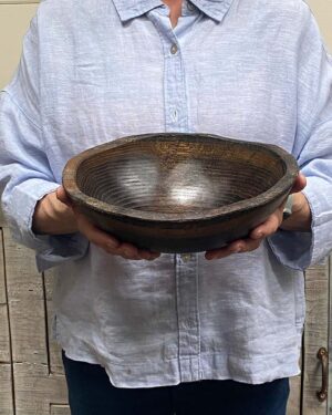 Small 10-inch ebonized oak oval, live edge wooden bowl, food-safe and artisan-crafted with a deep black finish.