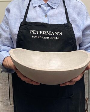 Medium 13-inch white pearl oak oval, live edge wooden bowl, light-toned artisan-crafted bowl with live edge.