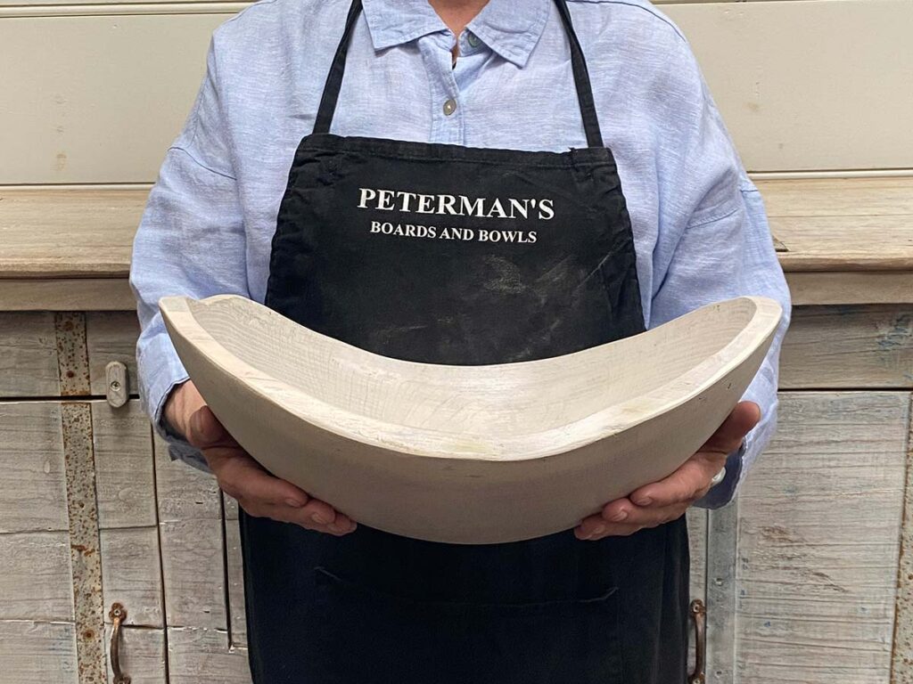 Large 15-inch white pearl oak oval, live edge wooden bowl, elegant light finish, food safe for entertaining or salad.