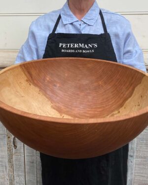 XXL jumbo 21-inch round Cherry wooden bowl, hand-turned, food-safe, perfect for salads or centerpiece serving.