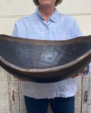 XXL jumbo 21-inch Ebonized Oak oval wooden bowl, handcrafted with a unique live edge design, food-safe for entertaining.
